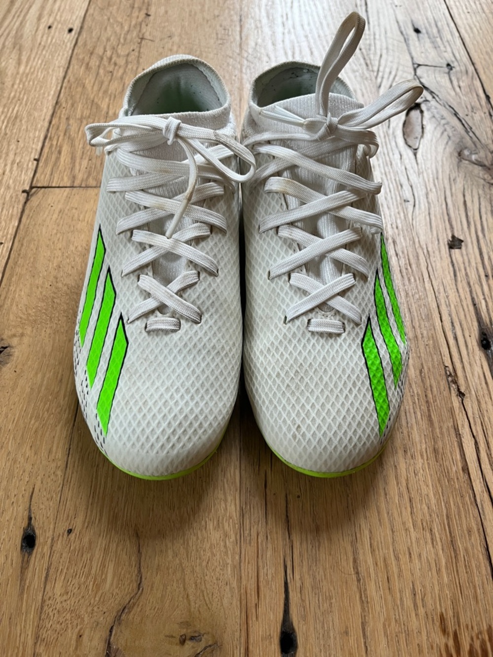adidas white and green soccer cleats